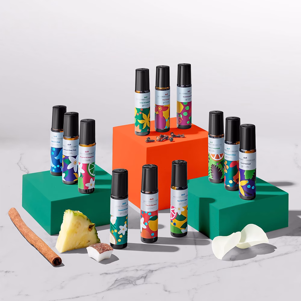 Colorful perfume bottles on display blocks.