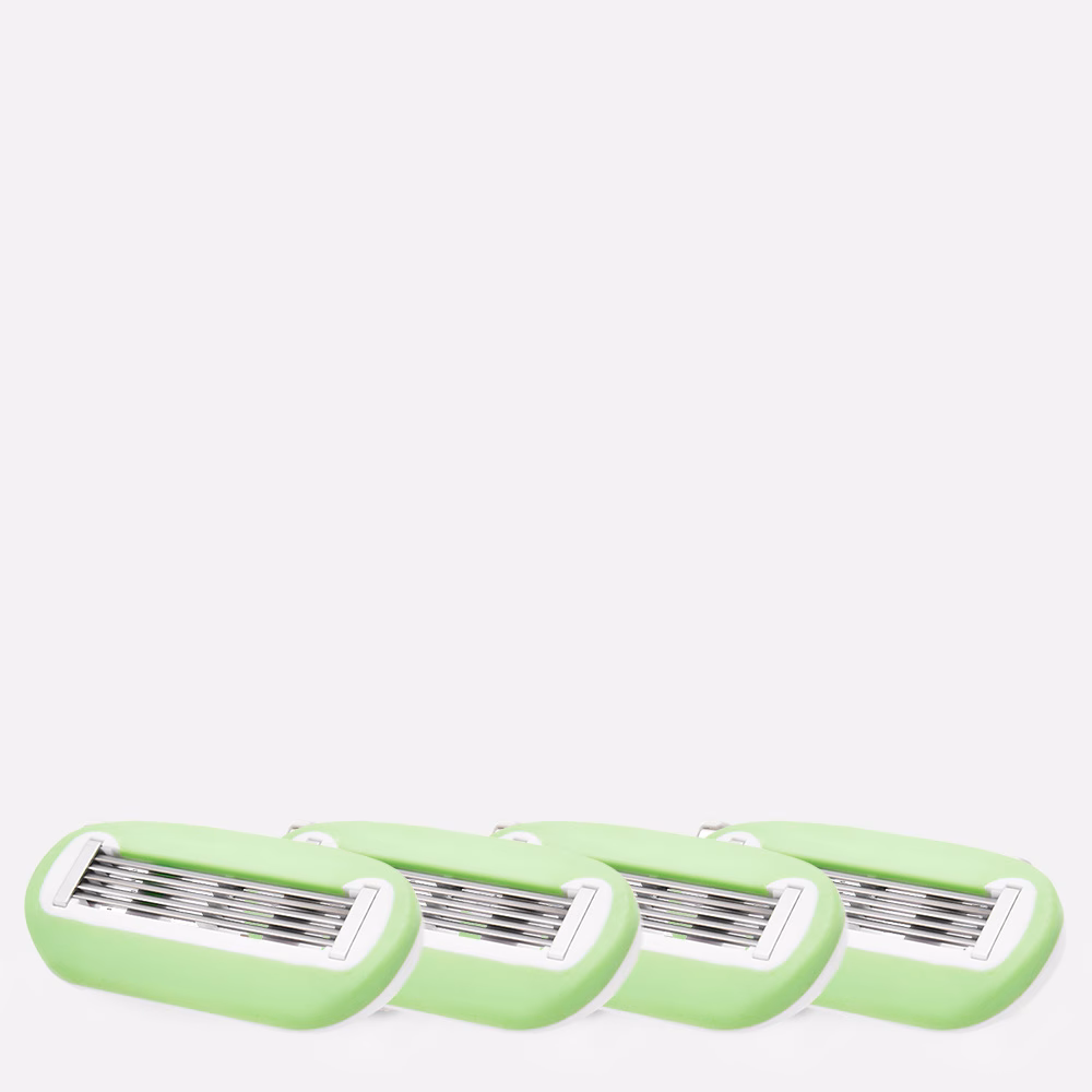 Four green razor blades