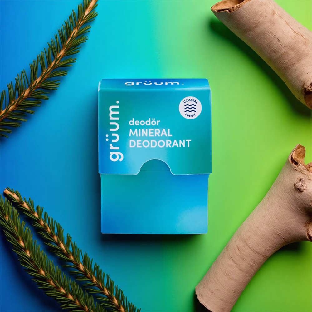 Box of mineral deodorant on colorful background.