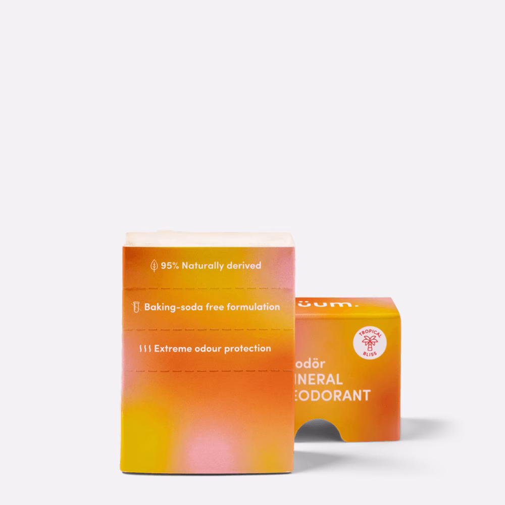 Natural deodorant packaging, orange and pink design.