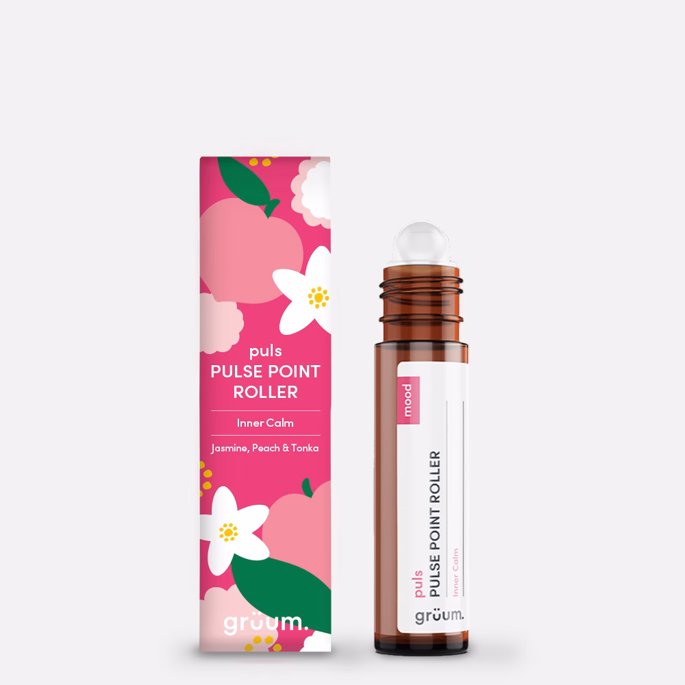 Pulse point roller and packaging with flowers.