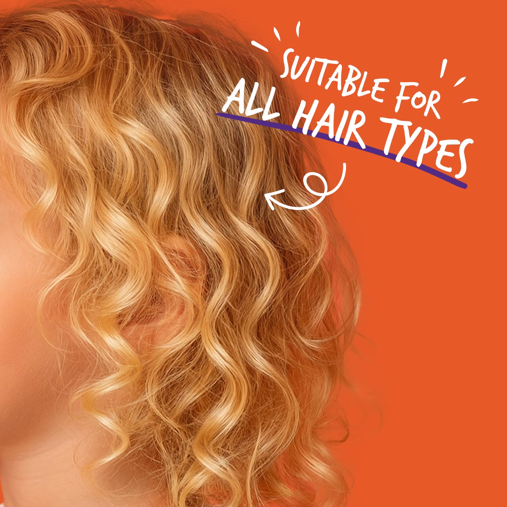 Curly hair on orange background.