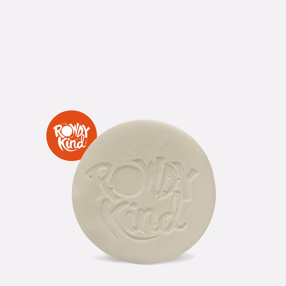 Round soap bar with engraved logo.