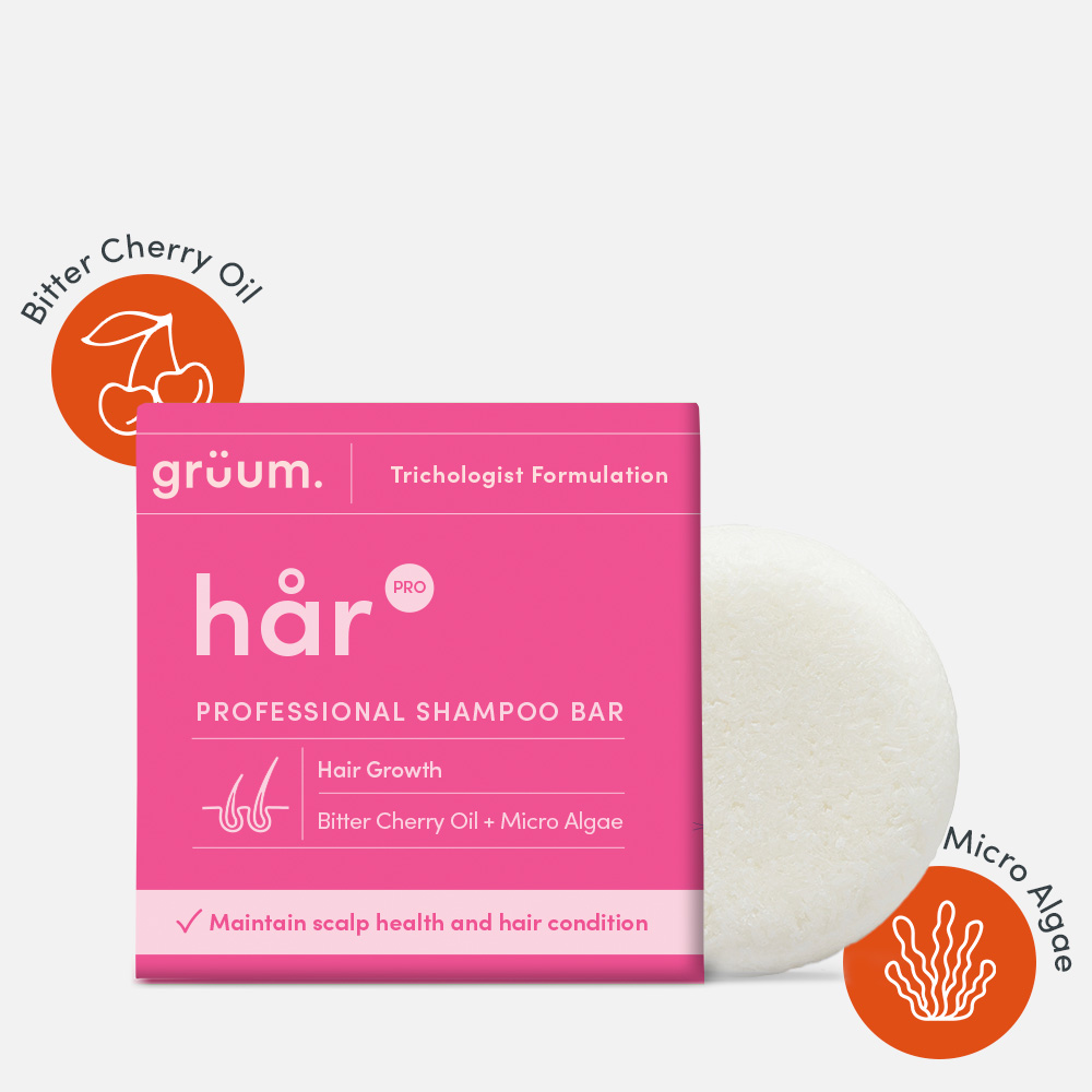 Pink shampoo bar packaging and white bar