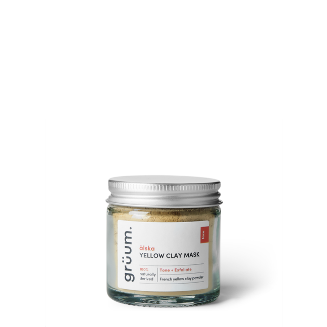 Yellow clay mask in glass jar