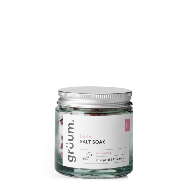 Jar of salt soak with rose petal.