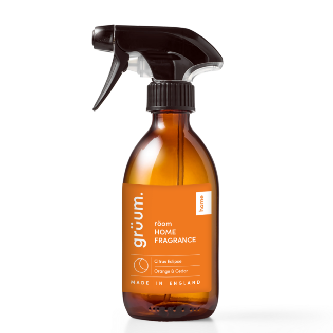 Brown spray bottle with orange label