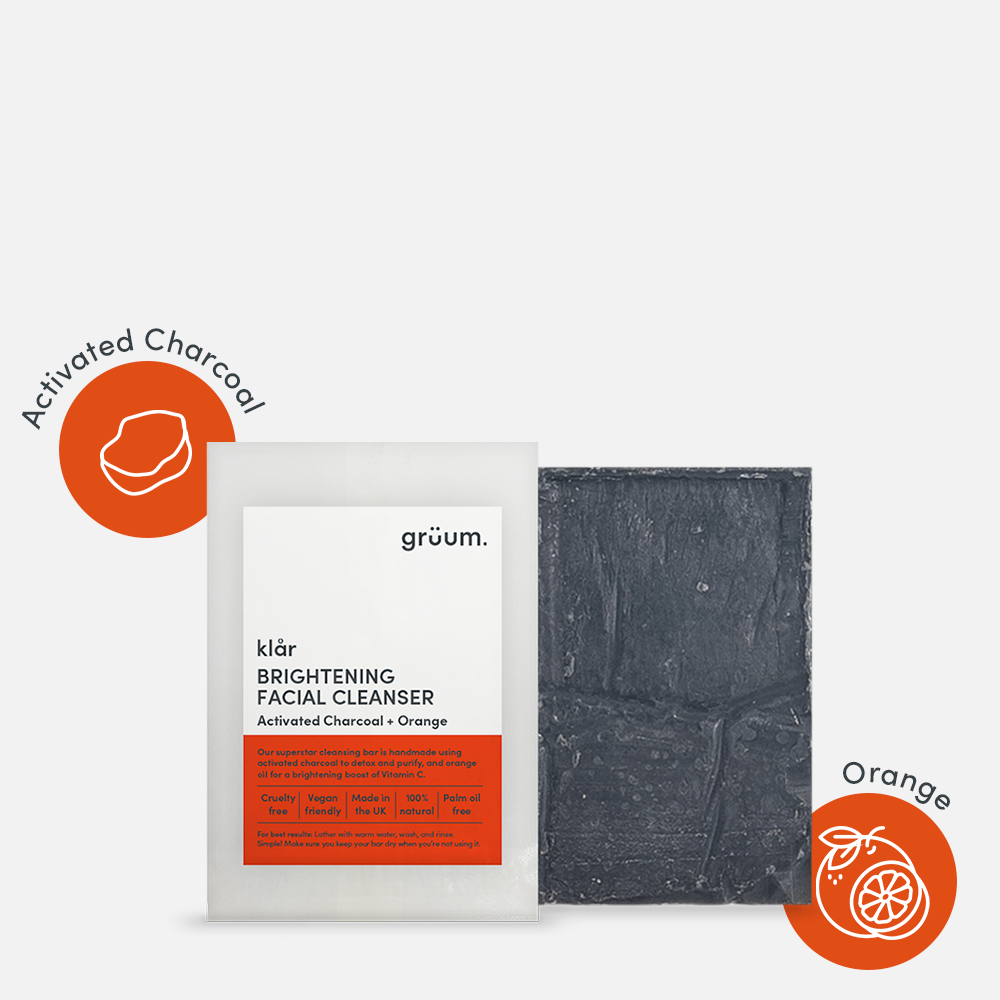 Brightening facial cleanser with charcoal and orange