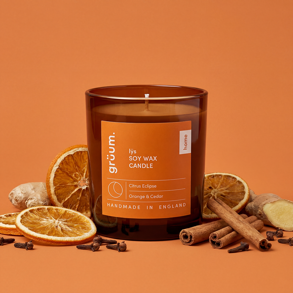 Candle with spices and dried orange slices
