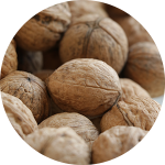Pile of whole walnuts.