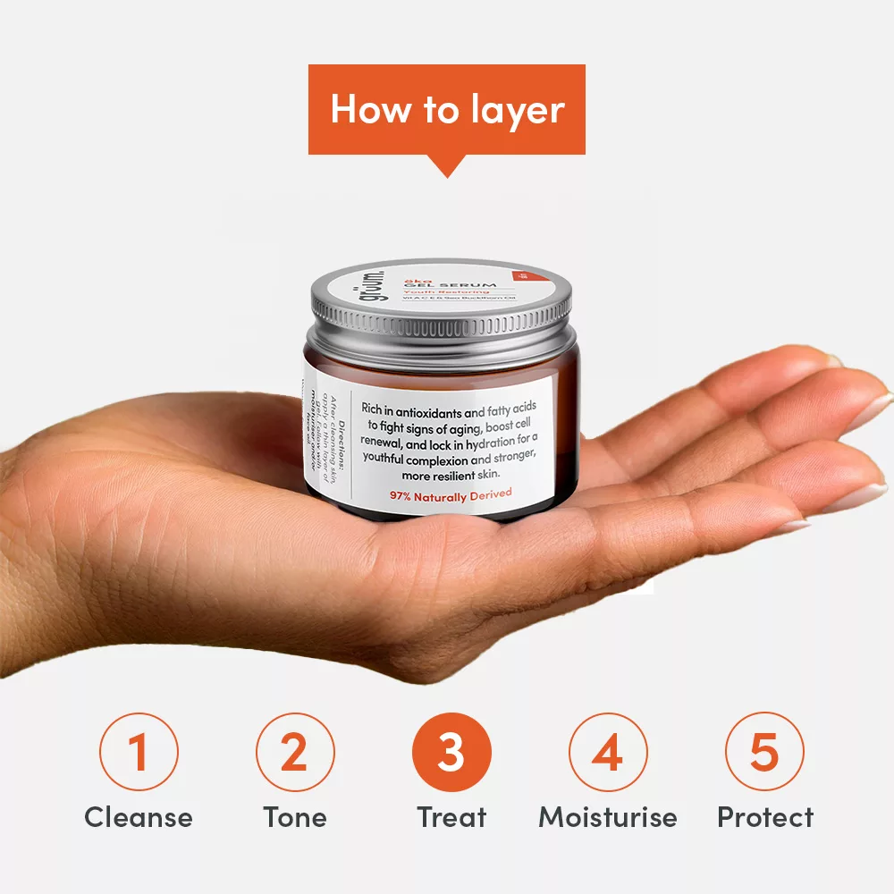 Hand holding skincare jar with instructions.