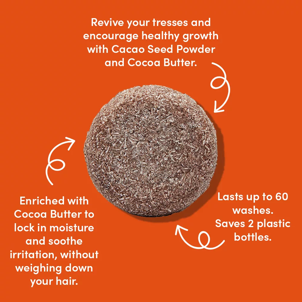 Brown shampoo bar on orange background.