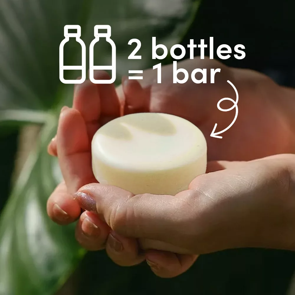 Hand holding a soap bar.