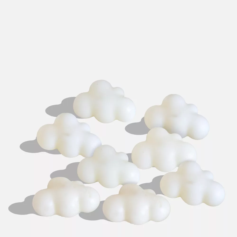 White cloud-shaped objects scattered