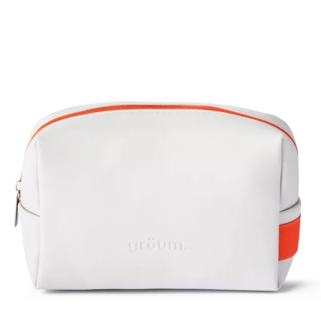 White toiletry bag with orange zipper