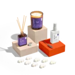 Candle and diffuser set with packaging.